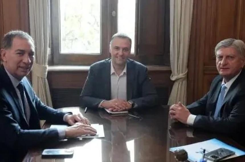 Ziliotto reunido en Santilli y Adorni