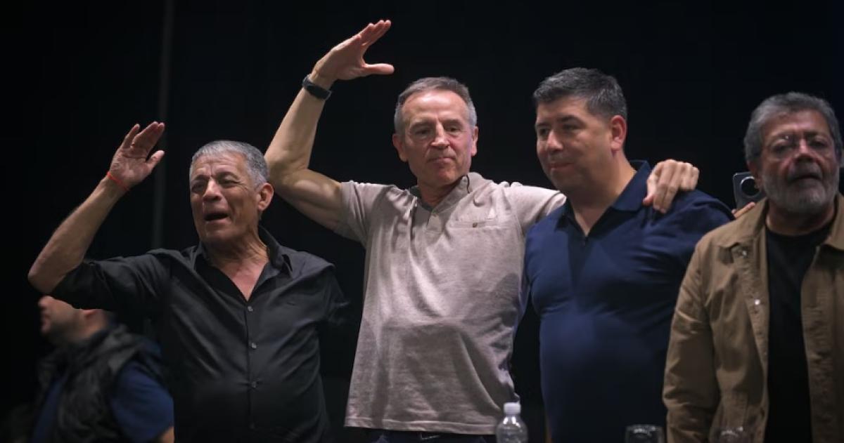 Los cotitulares de la CGT Octavio Argüello Jorge Sola y Cristian Jerónimo con Gerardo Martínez