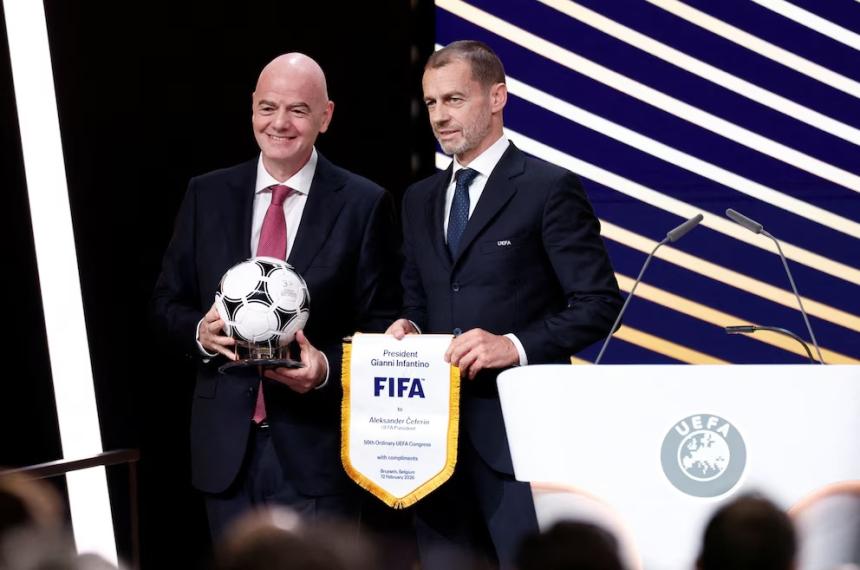 Infantino y Ceferin durante el 50° Congreso de la UEFA