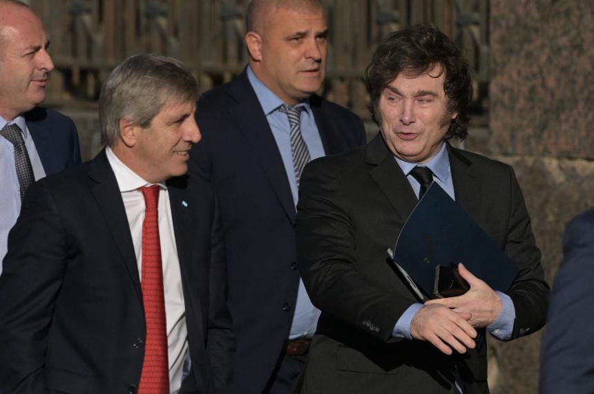 El ministro Luis Caputo y el presidente Javier Milei